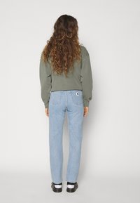 Carhartt WIP Vaqueros rectos - bleached denim