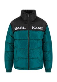 Kurtka puchowa z czarną górną częścią i turkusową dolną częścią. Na piersi duży napis "KARL KANI", zapięcie na zamek błyskawiczny i elastyczne mankiety.