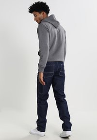 Carhartt WIP RUCK SINGLE KNEE PANT - Calças de ganga de perna direita - blue rigid