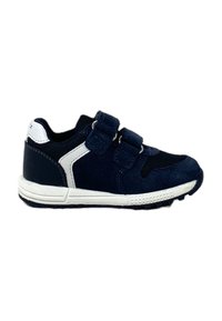 Zapatillas de deporte velcro en azul marino con detalles en blanco, con un upper texturizado y una suela de goma con un patrón de agarre. Ligeras y diseñadas para la comodidad.