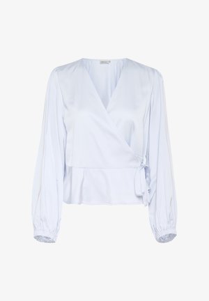 Light blue wrap blouse in smooth fabric. Features long, puffed sleeves, gathered cuffs, and a tie detail at the waist.