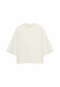 Gekürztes, kurzärmliges T-Shirt aus cremefarbenem Baumwollstoff; Raglanärmel, runder Ausschnitt, glatte Textur, minimalistisches Design, keine Muster oder Akzente.