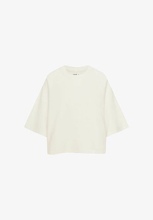 Gekürztes, kurzärmliges T-Shirt aus cremefarbenem Baumwollstoff; Raglanärmel, runder Ausschnitt, glatte Textur, minimalistisches Design, keine Muster oder Akzente.