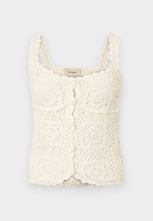 Cream crochet top with scalloped edges and square motifs. Features adjustable straps and button closure. Made of textured, lightweight fabric.