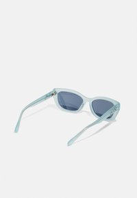 Swarovski Akiniai nuo saulės - milky light blue/polar dark blue