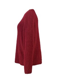 Pull rouge texturé à coupe décontractée et manches longues, avec un tissu doux et pelucheux et un col rond.