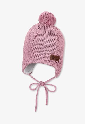 Knitted pink hat with a pom-pom on top, ear flaps, and ties. Lined with soft fabric, features a small brown logo patch on the side.