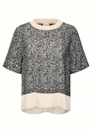 Black and white floral short-sleeve top with a wide cream-colored collar and hem, loose fit, and round neckline.