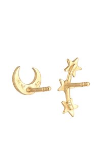 Orecchini in tono dorato con design a luna crescente e stella. Realizzati in argento sterling 925 con una finitura lucida. Semplici chiusure a monachella.