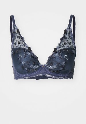 Sutiã de renda azul marinho com bordado floral, copas transparentes e alças ajustáveis. Apresenta bordas onduladas e um pequeno detalhe decorativo no centro.