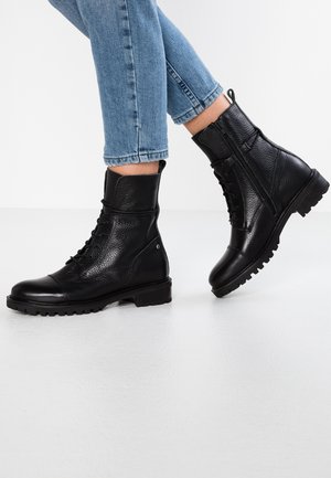 Bottines à lacets - black