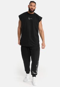 Karl Kani SMALL SIGNATURE SLEEVELESS TEE  - Topper - black