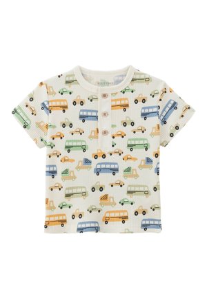 T-shirt crème à manches courtes en tissu côtelé, orné de motifs de véhicules colorés en bleu, orange, vert et noir, avec trois boutons.