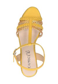 Yellow leather high-heel sandal with woven straps and an ankle buckle. Smooth sole features branding. Open-toe design.