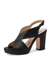 Tacchi slingback aperti neri con cinturini incrociati, finitura strutturata e tacco alto chunky. Interno liscio con cinturino regolabile.