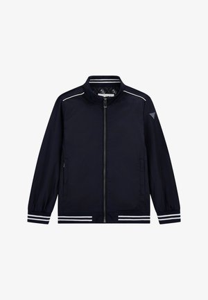 Jachetă ușoară de marină cu guler înalt, fermoar frontal, dungi albe pe umeri și manșete, și două buzunare laterale. Textură de țesătură netedă.