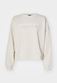 Beige színű pulóver, puha anyagból készült, kerek nyakkal, eső vállakkal és fehér hímzett "BARBOUR INTERNATIONAL" logóval.