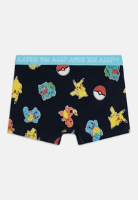 Boxers en coton pour garçons, de couleur marine, ornés de personnages Pokémon colorés et d'une ceinture élastique bleu clair avec le texte "ATTRAPEZ-LES TOUS !"