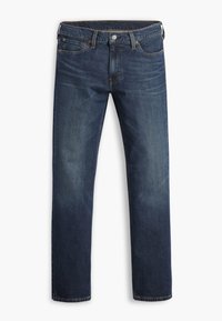 Jean en denim bleu foncé à jambe droite, avec poches avant, passants de ceinture et fermeture par bouton sur fond blanc.