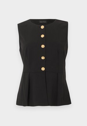 Μαύρο αμάνικο μπλουζάκι με στρογγυλή λαιμόκοψη, πέντε χρυσά διακοσμητικά κουμπιά στο μπροστινό μέρος και διακριτικές πιέτες στο τελείωμα.