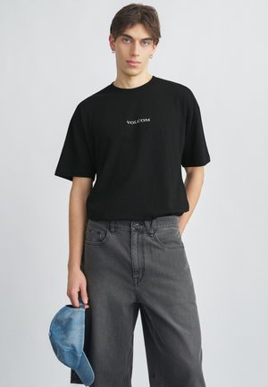 STONE - Navadna majica - black