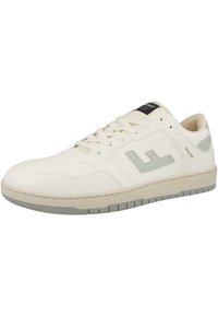 White leather sneaker with grey accents, perforated toe, flat laces, and textured sole. Features a grey logo on the side and a black tongue label.