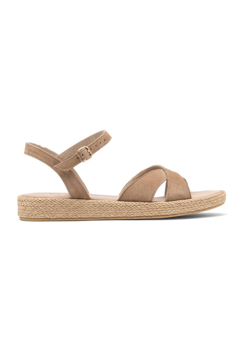 Ruske suede sandaalit, joissa on espadrille-tyylinen punottu pohja. Varustettu säädettävällä nilkkahihnalla ja avoimella varpaalla, jossa on ristiin menevät hihnat.