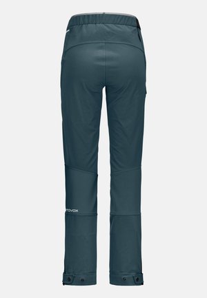 Dark teal softshell pants with elastic waistband, two side pockets, and snap closures at the cuffs. Smooth texture and durable design.