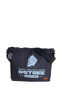 Dark blue canvas messenger bag with a light blue ship graphic, adjustable strap, and leather tag detailing. Features a spacious main compartment.