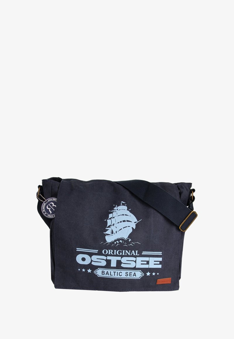 Dark blue canvas messenger bag with a light blue ship graphic, adjustable strap, and leather tag detailing. Features a spacious main compartment.
