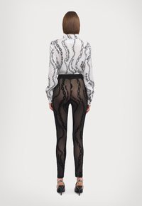 Versace Jeans Couture CO TAPE - Pajkice – hlače - black