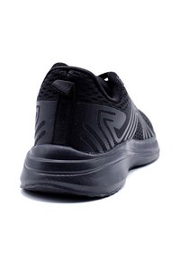 Chaussure de course noire vue de dos, présentant une tige texturée, un talon renforcé et une semelle légère conçue pour le confort.