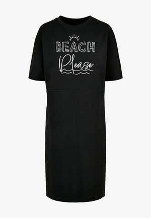 Sort t-shirt kjole lavet af blødt bomuld, med korte ærmer og rund halsudskæring. Trykt "BEACH Please" design i hvid.