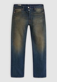 Jean en denim bleu avec des zones décolorées sur les cuisses, fermeture à boutons, design cinq poches et rivets en cuivre sur les poches avant.