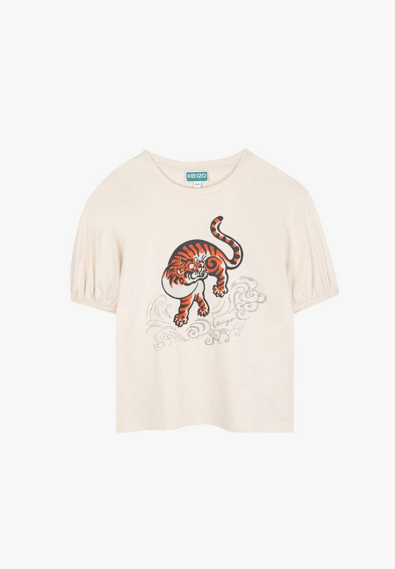 T-shirt crème à manches courtes avec des manches bouffantes, mettant en vedette un graphique de tigre coloré et des motifs de vagues tourbillonnants, fabriqué en matériau en coton doux.