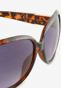 Next POLARIZED brązowy