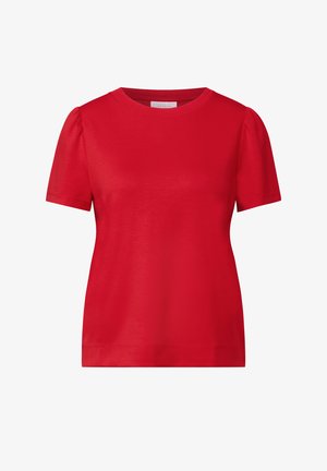 T-shirt rosso a maniche corte in morbido tessuto con scollatura rotonda e maniche a sbuffo. Presenta una texture liscia e orlo dritto.