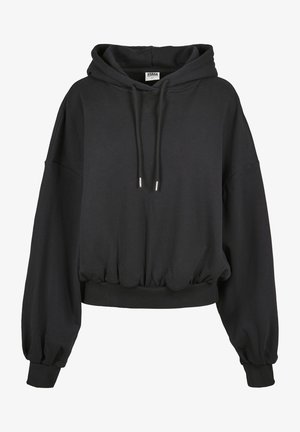 Must mustärgiga kapuutsiga, laia lõikega, laiad varrukad ja ribaga äär. Valmistatud pehmest kangast, millel on sile tekstuur.