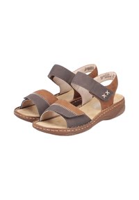 Brown leather sandals with two wide straps, open toe, and stitched accents. Cushioned insole and contoured rubber outsole for comfort.