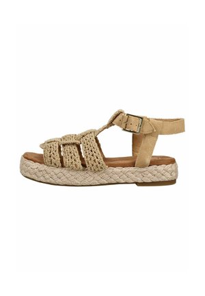 Sandale à bride tissée beige avec semelle plateforme tressée, bride de cheville réglable avec boucle et semelle intérieure rembourrée, conçue pour un usage décontracté.