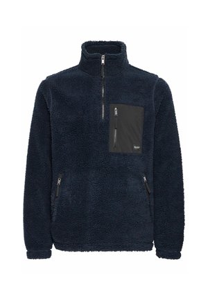 Marineblå fleece-pullover med høj krave, kvart-zipp foran, lomme på venstre bryst og lynlåslommer i siden; tekstiler, blød stof.