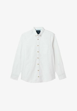 Fehér, hosszú ujjú ing, gombos gallérral, aranygombokkal és mellzsebből áll. Simább anyagból készült, amely finom textúrával rendelkezik.