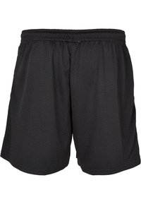 Shorts de sport noirs en tissu maillé respirant, dotés d'une taille élastique et conçus avec une coupe ample pour plus de confort.