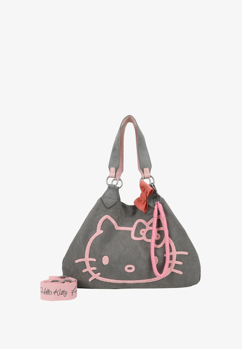 Borsa a tracolla in tessuto grigio con un design di Hello Kitty rosa, un accento a fiocco e una tracolla removibile con la scritta "Hello Kitty". Texture complessivamente liscia.
