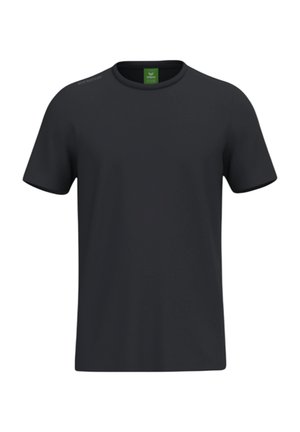 T-shirt noir uni à manches courtes avec col rond et petite étiquette verte à l'intérieur du col.