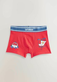 Boxers en coton rouge avec une ceinture élastique bleue portant l'inscription "SAMEDI." Présentant des imprimés de voiture de police et d'hélicoptère de chaque côté.