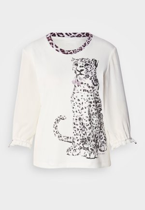 Weißes Langarmshirt mit schwarzem Leopardenmotiv, mit gemustertem Besatz am Ausschnitt und elastischen Manschetten mit silbernen Akzenten.