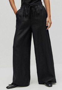 Dobber NATALIA - Tygbyxor - black