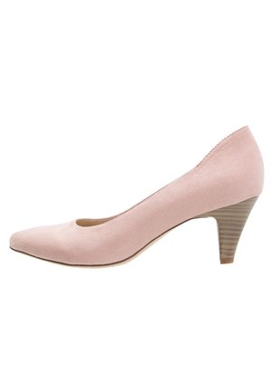 Pompe pour femmes à bout pointu en suède rose clair, avec un petit talon empilé et une semelle lisse, vue de côté.