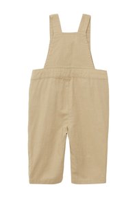 Beige Baumwoll-Latzhose mit verstellbaren Trägern, geradem Bein und strukturierter Oberfläche. Keine Taschen oder Verzierungen vorhanden.